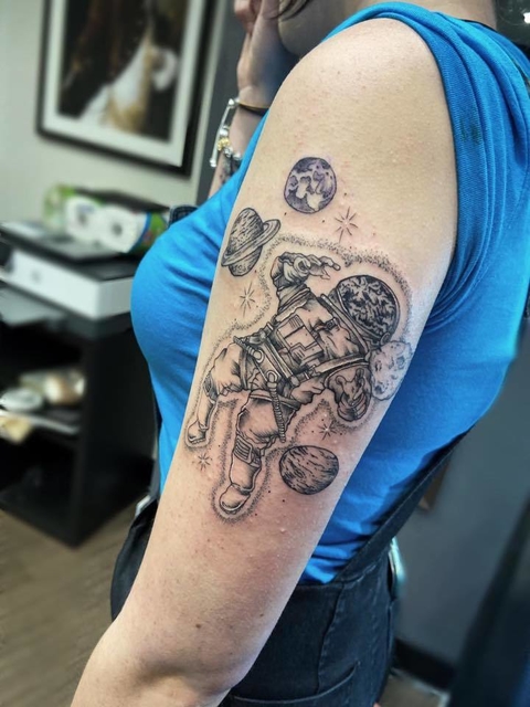 shoulder tattoo american astronaut